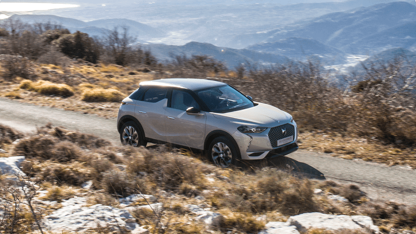 A grey DS 3 Crossback on the road